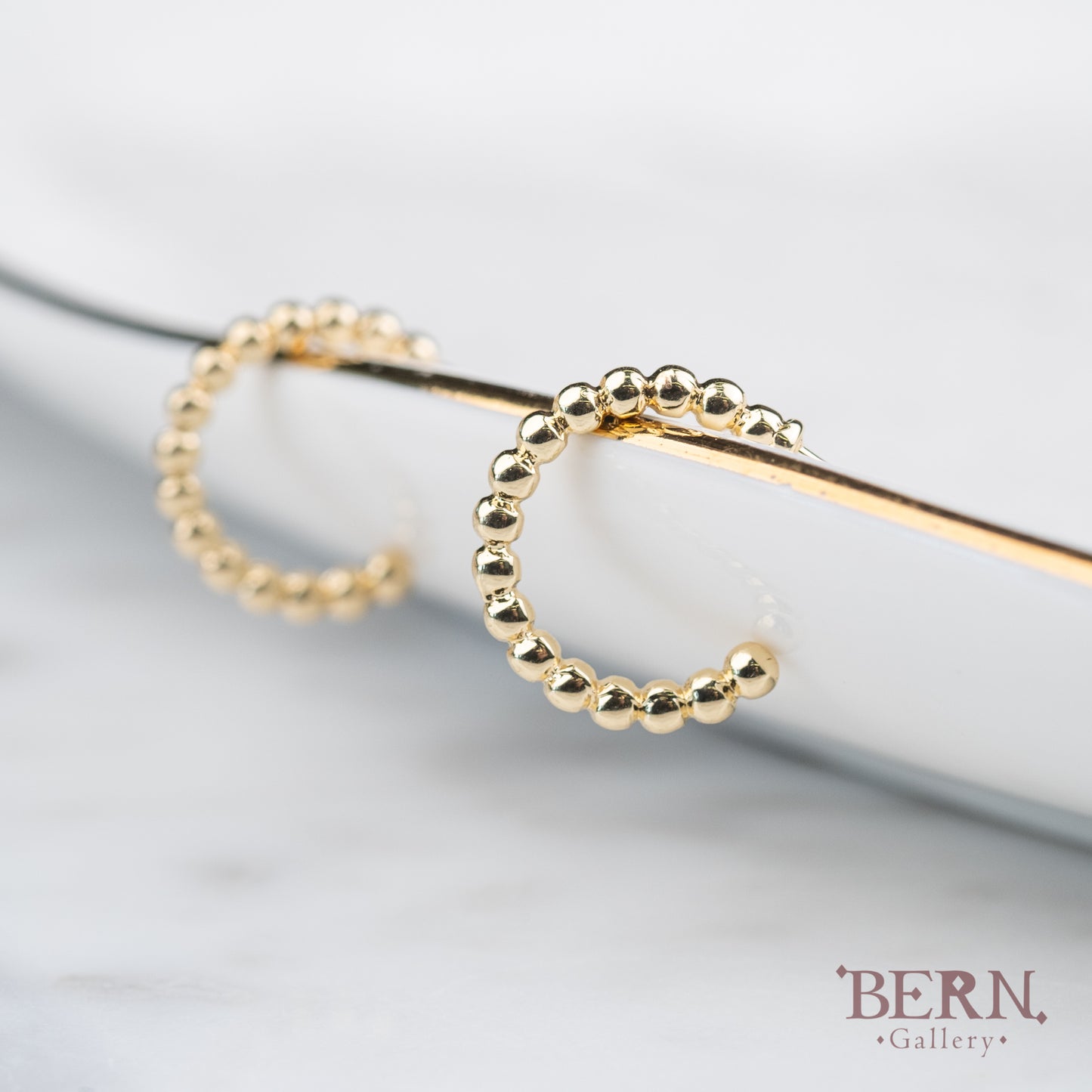 Gold ball hoop earrings